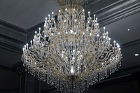 Elegant chandelier hanging from ceiling. Free public domain CC0 image.