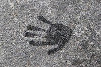 Handprint on rock. Free public domain CC0 image.