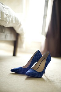 Blue high heels on the ground. Free public domain CC0 image