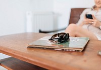 Sunglasses on table. Free public domain CC0 photo.