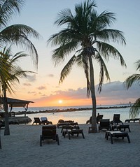 Beautiful empty beach sunset. Free public domain CC0 image.