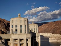 Two of four 338-foot-high intake towers that stand in the deep waters of Lake Mead behind massive Hoover Dam, which straddles the border between Arizona and Nevada in the Black Canyon of the Colorado River.