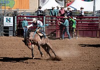 Saddle-bronc contest at the All-Indian Rodeo, a featured competition in Phoenix, open only to Native Americans with proof of tribal identification, at the annual Arizona State Fair, which has been held since 1884, eighteen years before statehood, when it was a territorial fair.