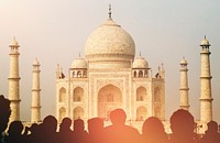 View of Taj Mahal with tourist silhouettes