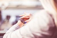 Free woman wearing watch photo, public domain travel CC0 image.