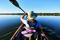 Free woman canoeing in a river image, public domain CC0 photo.