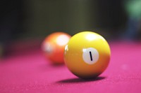Free yellow pool ball on pool table image, public domain CC0 photo.