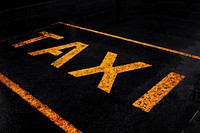 Free taxi road sign on the floor image, public domain CC0 photo.