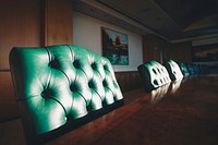 Free green chair in meeting room photo, public domain office CC0 image.