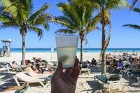 Free drinks with beach background photo, public domain beverage CC0 image.