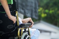 Pushing a wheelchair, free public domain CC0 photo
