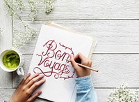 An artist creating hand lettering artwork from motivation quote