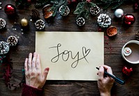 Christmas themed card with a text Joy