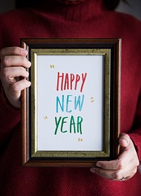 Phrase Happy New Year in a frame