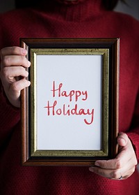 Phrase Happy holiday in a frame