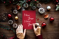 Phrase New Year New You on a red paper