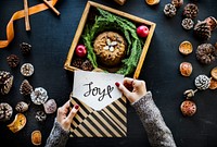Christmas themed card with a text Joy