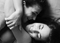 Lesbian couple in love on the bed