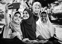 Group of students using a mobile phone