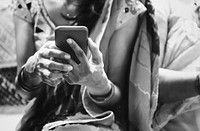 Indian woman using mobile phone