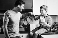 Father and son in kitchen