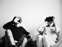 Asian couple experiencing virtual reality with VR headset