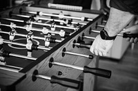 People playing table football together