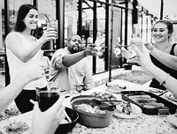 Friends doing a toast outdoors