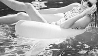 Girl cooling down in a swimming pool