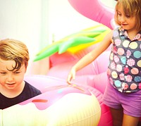 Kids playing with colorful floating devices