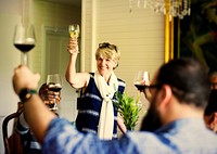 Woman holding a toast at a party