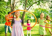 Cute diverse kids playing in the park