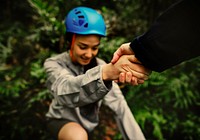 Boyfriend giving a helping hand to his girlfriend