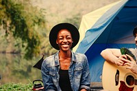 Happy woman at a campsite