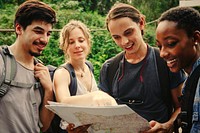 Friends checking where to go on a map