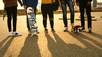 Group of teenage friends with skateboards