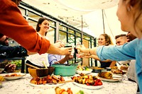 Friends toasting at a summer party