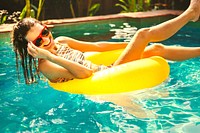 Girl cooling down in a swimming pool