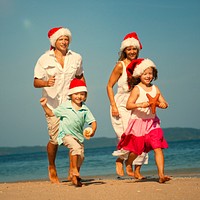 Family enjoying a Christmas holiday at the beach