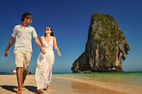 Couple on a beach honeymoon