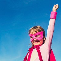 Strong girl in pink superhero outfit