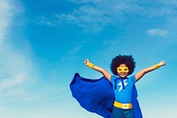 Strong girl in blue superhero outfit