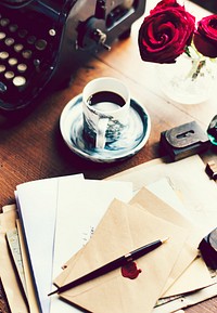 Letters and a cup of coffee on a table