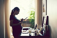 Pregnant woman working from home