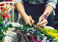 Woman making a flower arrangement
