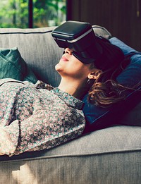Woman enjoying virtual reality goggles