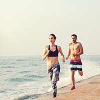 Couple jogging at the beach