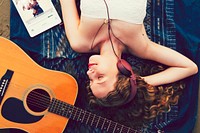 Girl relaxing and listening to music