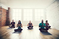Group of people practicing yoga