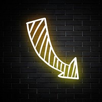 Neon yellow curved arrow sign on brick wall